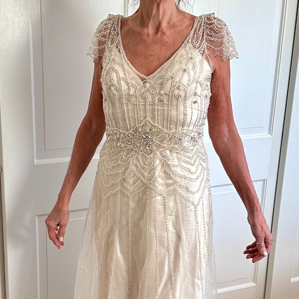 Wedding gown, size 8 altered to 4